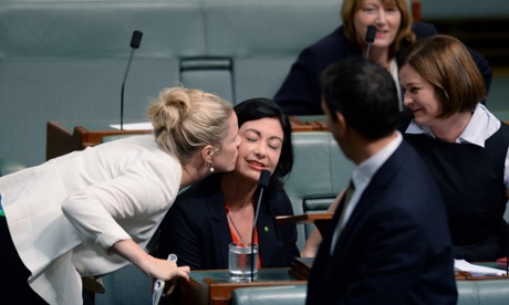 Labor MP Clare O'Neil congratulates the newly elected member for Griffith Terri Butler after holding her maiden speech in the House of Representatives at Parliament House in Canberra, Thursday, Feb. 27, 2014.