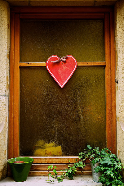 Your Pictures - Heart: red heart hanging outside of window