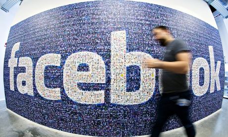 Facebook logo created with pictures of its users