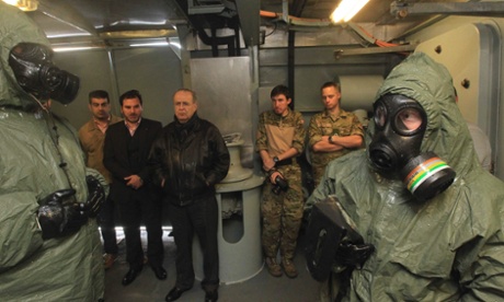 Danish chemical warfare officers on a frigate that is to escort chemical weapons shipments from Syria.