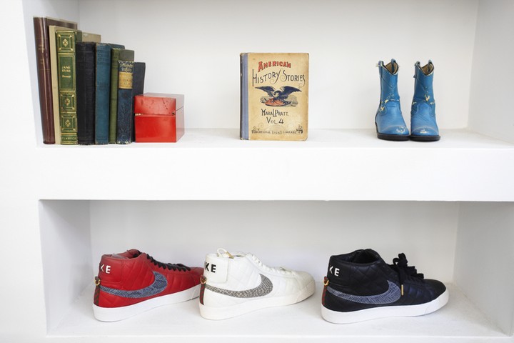 Moffatt: Detail of shoes and books on Shelf