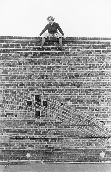 Oh What a Lovely War: Joan Littlewood sitting of the roof of Theatre Royal Stratford, 1973