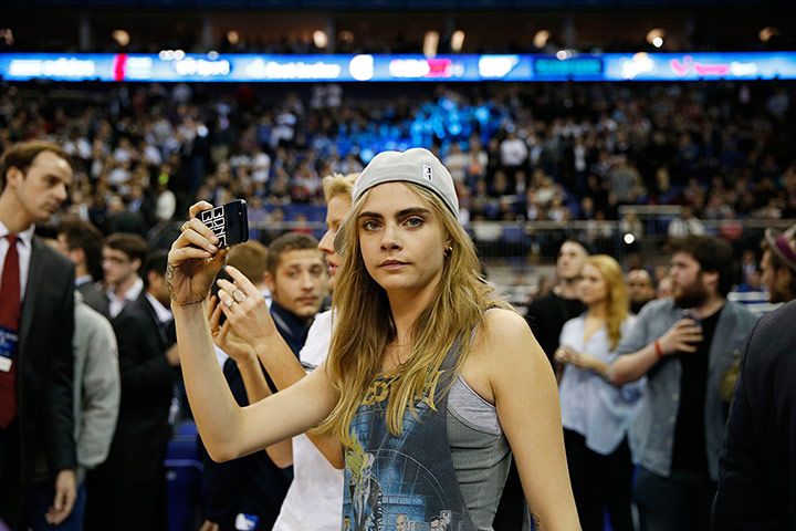 Fashionistas: Cara Delevingne at the Brooklyn Nets v Atlanta Hawks game