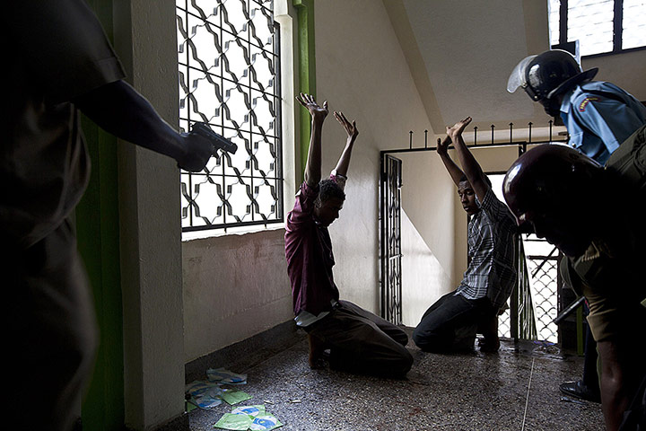20 Photos: Alleged jihadist youths are apprehended at the Masjid Mussa mosque in Kenya
