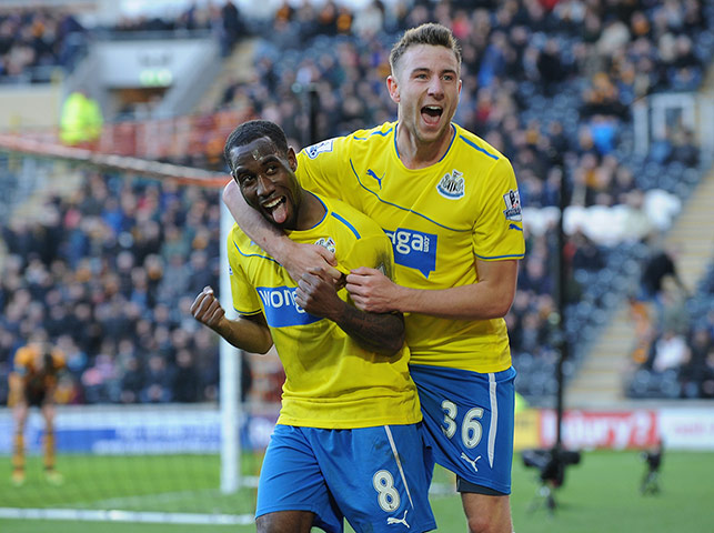 saturday roundup: Vurnon Anita celebrates with Paul Dummett