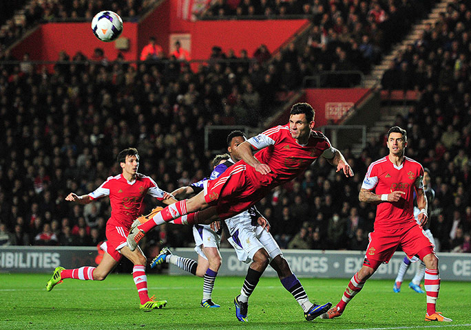 saturday roundup: Southampton's Dejan Lovren clears the ball 