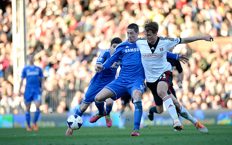 fulham v chelsea: Torres and Burn tussle for the ball 