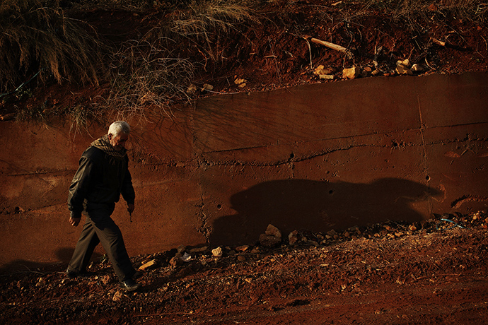 Qabaait, Northern Lebanon: Khoder Osman walks at dusk