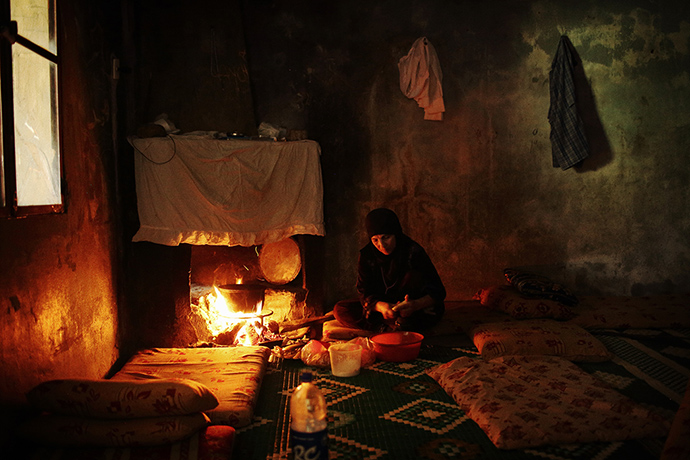 Qabaait, Northern Lebanon: A woman prepares food