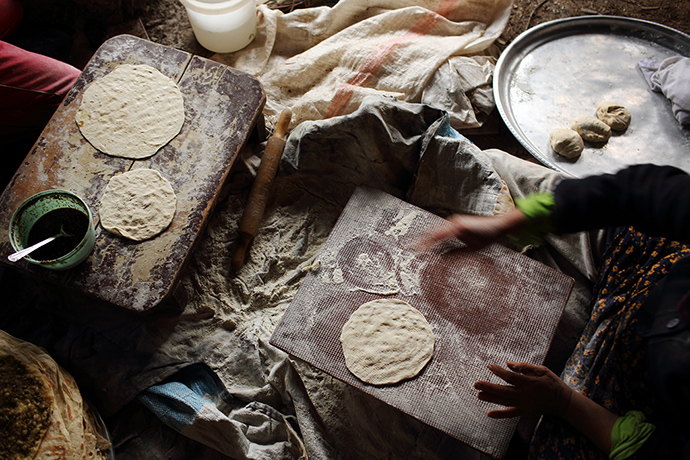 Qabaait, Northern Lebanon: A woman prepares bread