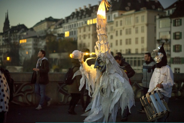 Revellers take part in the 'Morgestraich' marking the opening of the Basel Fasnacht Carnival in Basel, Switzerland. Starting at four in the morning when the city lights shut down, groups of fifers and drumers move through the town centre while playing carnival tunes.