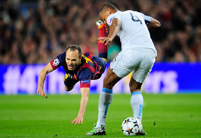 Barca v City: Andres Iniesta can't find a way past Vincent Kompany