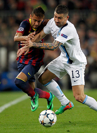 Barca v City: Manchester City's Aleksandar Kolarov with Barcelona's Neymar