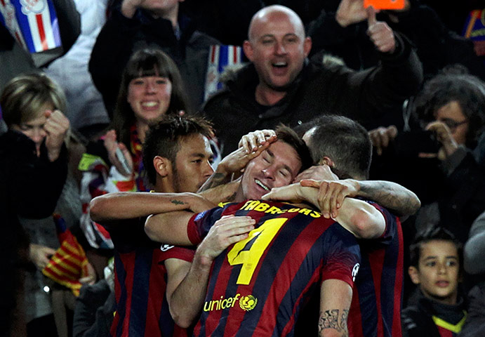 Barca v City: Barcelona's Messi is congratulated by his teammates 