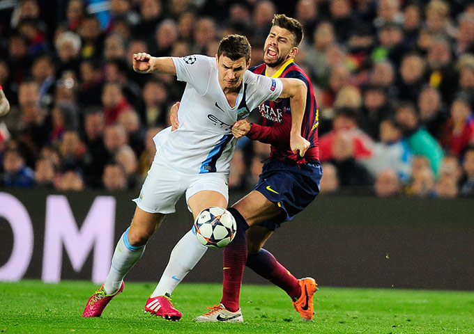 Barca v City: Pique tackles Dzeko