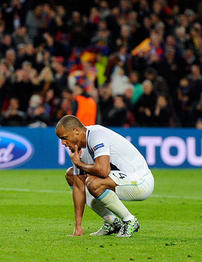 Barca v City: A dejected Manchester City captain Vincent Kompany
