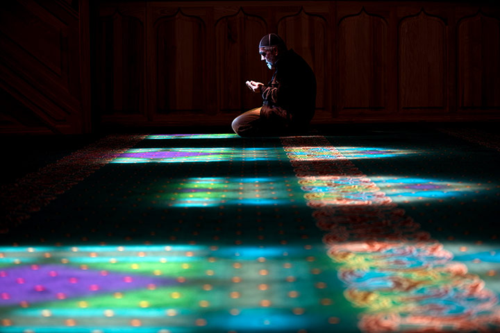 20 photos: A Crimean Tatar man prays at a mosque