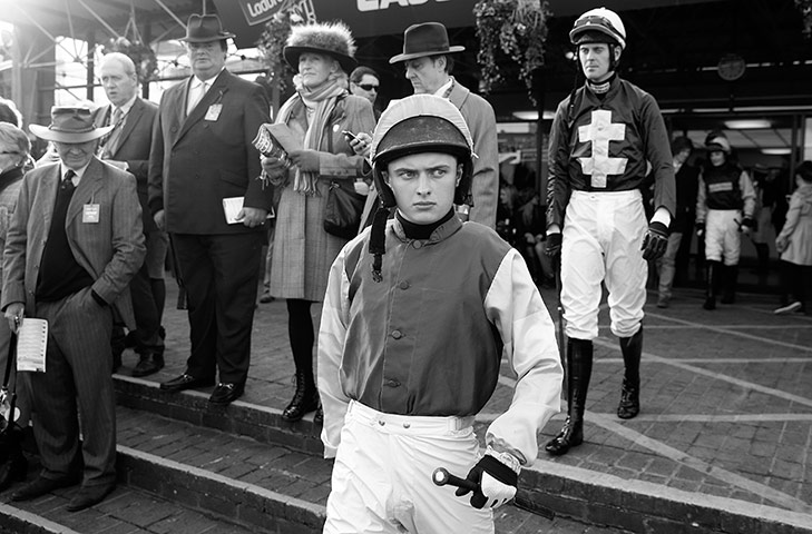 Cheltenham in b/w: Jockeys emerge from the weighing room