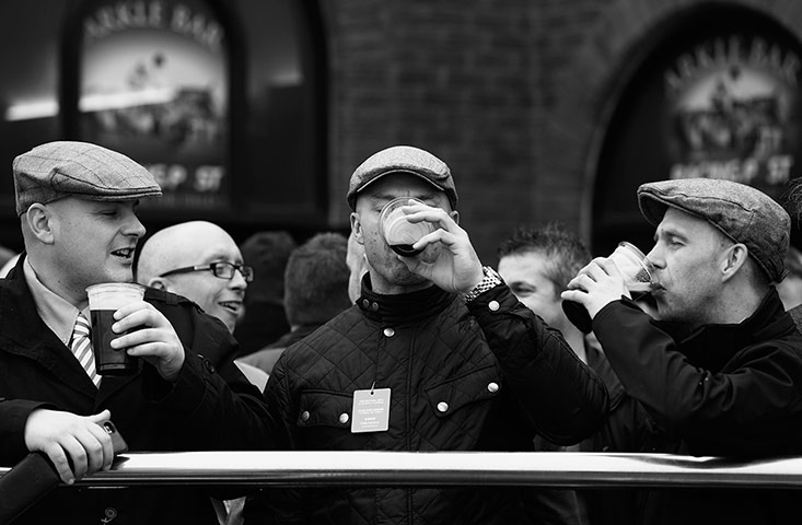 Cheltenham in b/w: Flat caps and pints