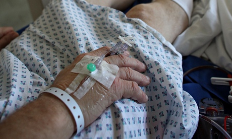 Man with drip in hand