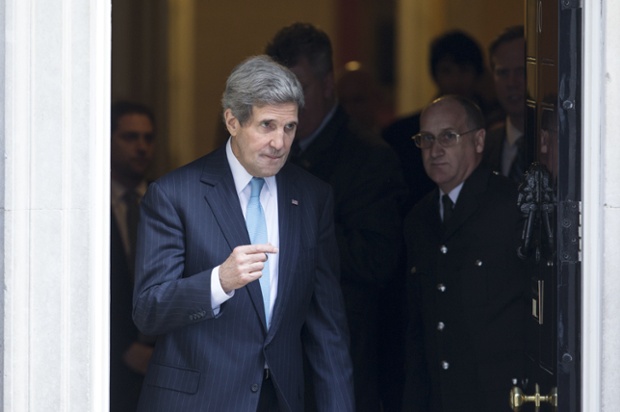 He leaves Number 10 Downing Street after the meeting with Cameron and Hague en route to the US Ambassador's residence in Regent's Park.
