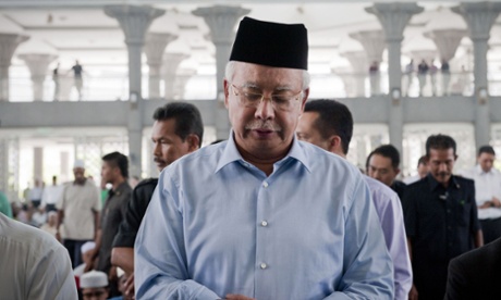 Malaysian Prime Minister Najib Razak prayers for passengers and crew of missing Malaysia Airlines flight MH370 at mosque near Kuala Lumpur International Airport, Malaysia.