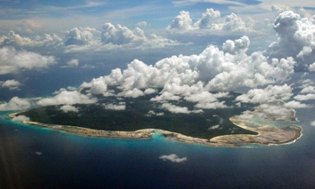 File photographs of clouds hanging over the North Sentinel Island, in India's southeastern Andaman and Nicobar Islands. India used heat sensors on flights over hundreds of uninhabited Andaman Sea islands on Friday, and will expand its search for the missing Malaysia Airlines jet farther west into the Bay of Bengal, officials said.