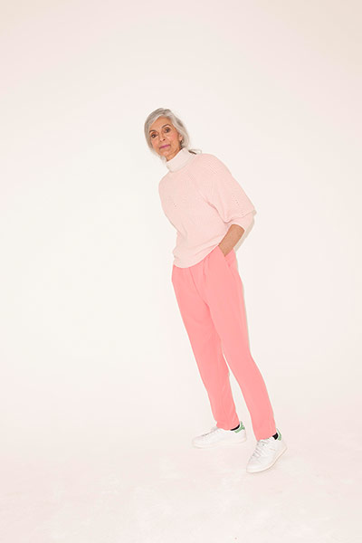 All Ages pink: pale pink jumper pink trousers white trainers