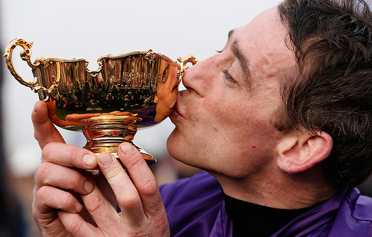 gold cup day: Davy Russell, the jockey of Lord Windermere, kisses The Gold Cup 