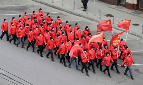 People march in formation as they participate in the 