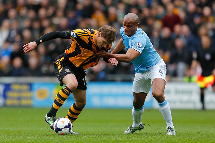 Hull v City: Nikica Jelavic and Vincent Kompany tussle 