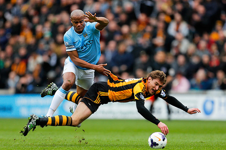 Hull v City: Nikica Jelavic and Vincent Kompany tussle 