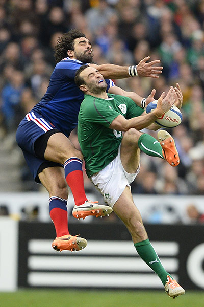 france v ireland: Dave Kearney, right, jumps for the ball with France's Yoann Huget 