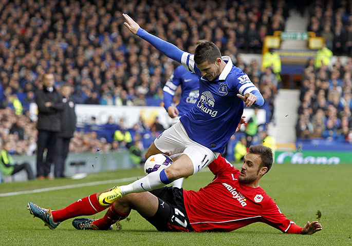 saturday's games: Kevin Mirallas tackled by Juan Cala