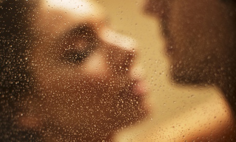 Couple kissing in a shower