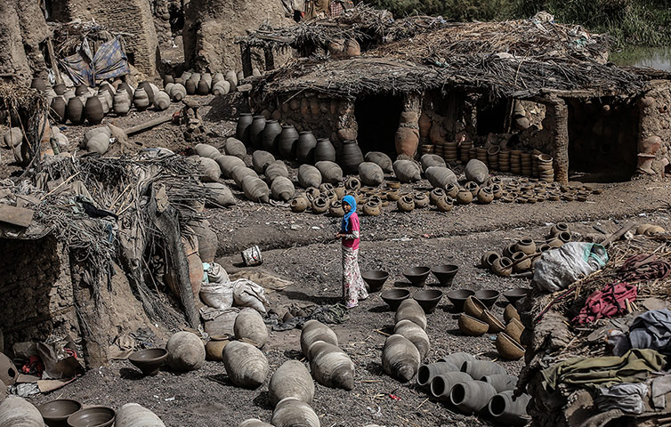 Egypt pottery: Jugs, containers and pots dry in the sun