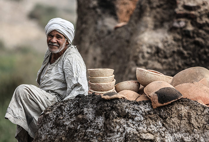 Egypt pottery: Fired pots lie to one side of a kiln