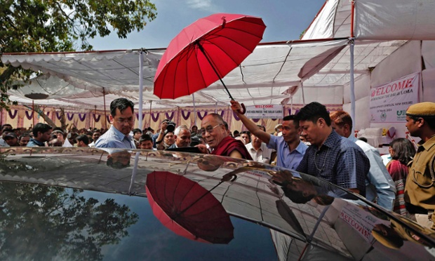 The Dalai Lama leaves after visiting a leprosy colony in New Delhi.