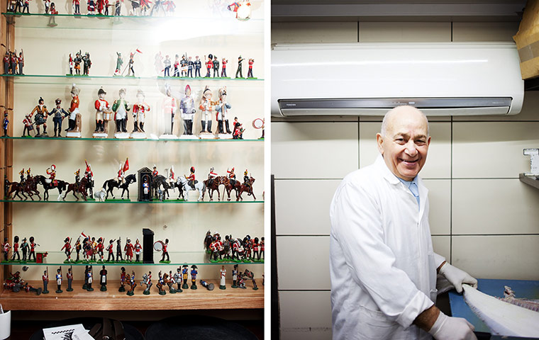 Tin soldiers on the inside of the cafe; senoir fish fryer Ali is seen 'backstage' prepping a huge fish