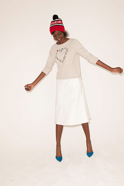 All Ages: sweater with heart white skirt blue shoes red bobble hat