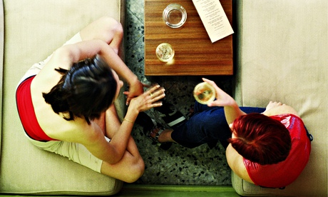 Women talking at a bar