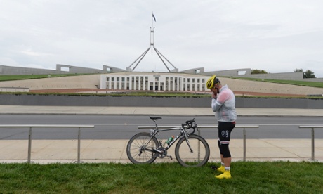 A participant of the Variety Children's Charity cycle tour is seen outside Parliament House in Canberra, Monday, March 24, 2014. The Variety Cycle will traverse across five states and territories covering 4000 kilometres.