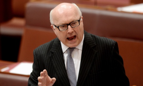 Liberla Senator George Brandis speaks the Senate chamber in Parliament House in Canberra.