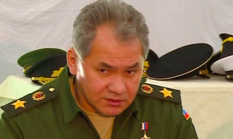 Russian defence minister Sergei Shoigu meets with Crimean officials at a military base in Sevastopol.