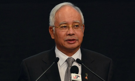 Malaysia prime minister Najib Razak speaks during a press conference where he announced that the missing Malaysia Airlines flight MH370