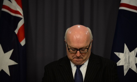 Attorney General George Brandis speaks during a press conference at Parliament House in Canberra, Tuesday, March 25, 2014.