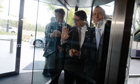 Prime Minister Tony Abbott arrives at the Asia Society Australia lunch at the Realm Hotel in Canberra, Tuesday, March 25, 2014.