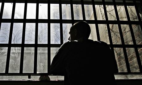 A prisoner in his cell
