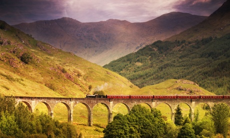 Jacobite steam train crossing Glenfinnan viaduct