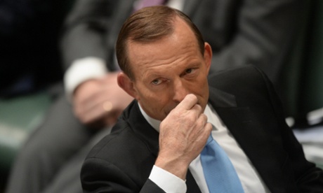 Prime Minister Tony Abbott reacts during House of Representatives Question Time at Parliament House in Canberra, Wednesday, March 26, 2014.